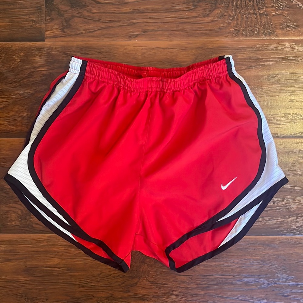 Red Nike shorts